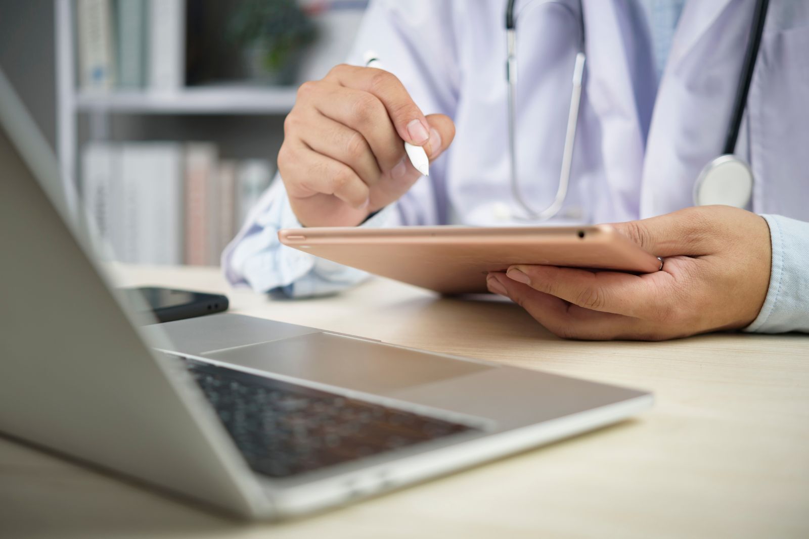 Telehealth provider video consultation on a screen