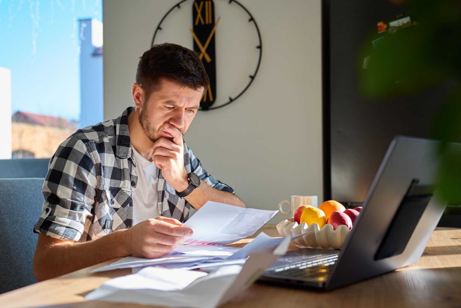 Man reviewing calendar and recovery plan at a desk