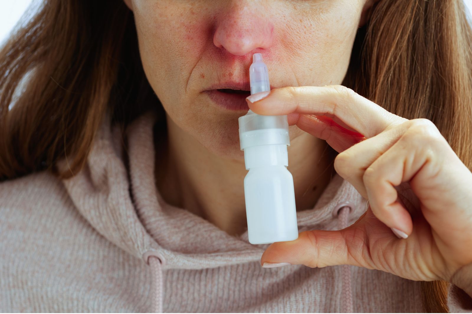 Naloxone nasal spray kit with packaging on a table