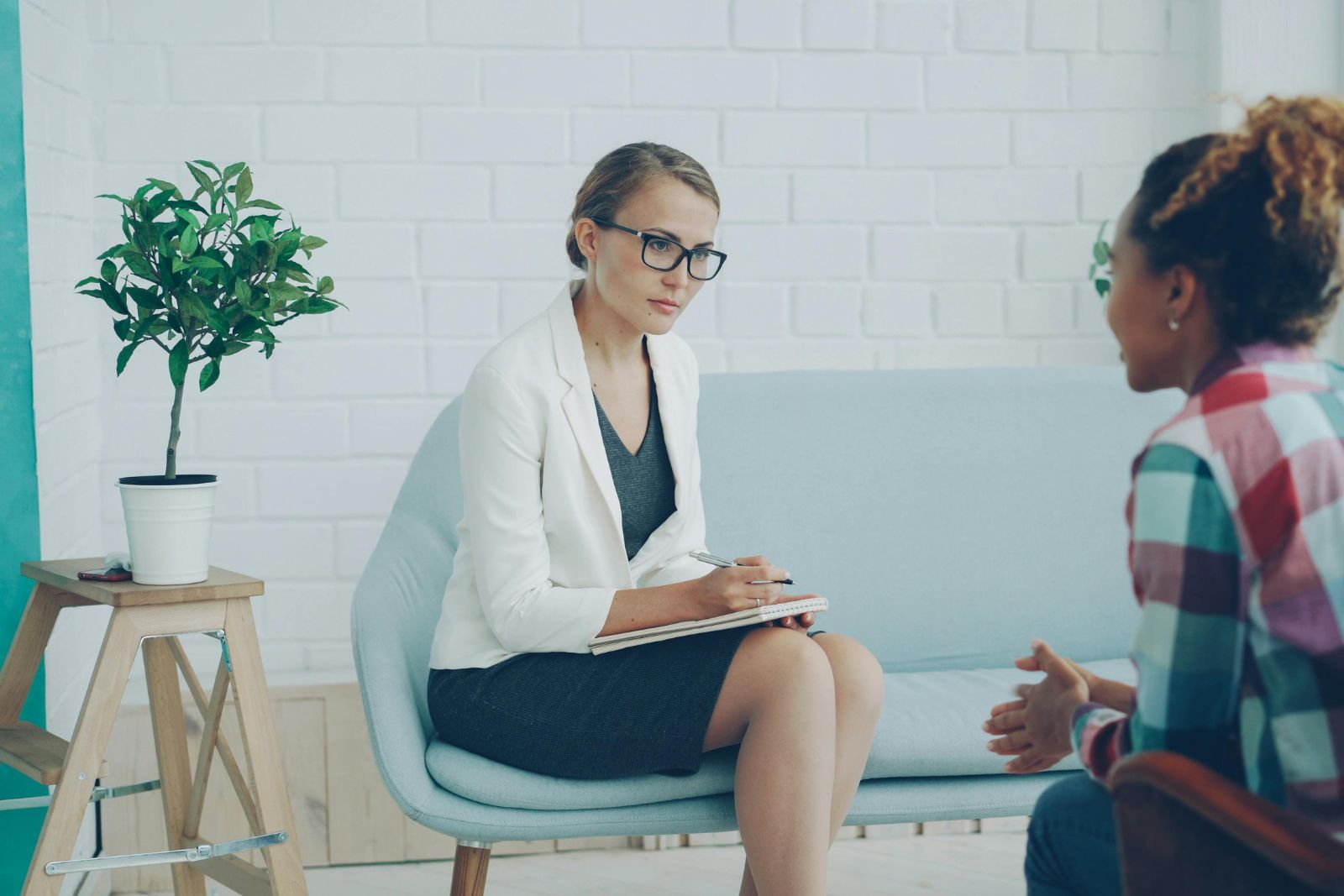 Adult speaking with a healthcare professional in an office